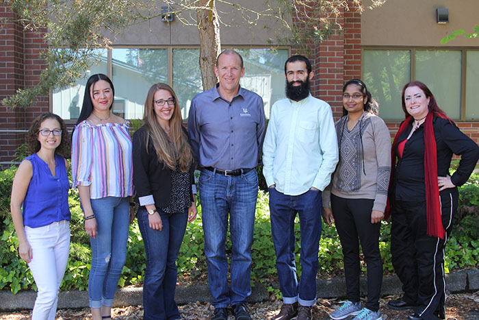 Edmonds CC Foundation Executive Director, Brad Thomas meets with 2018-2019 scholarship recipients. (from left to right) Sabrina Hernandez, Jennifer Corona, Joanna Coleman, Edmonds CC Foundation Executive Director Brad Thomas, Nedir Ziane, Kiranpreet Kaur, and Katherine Merriwether