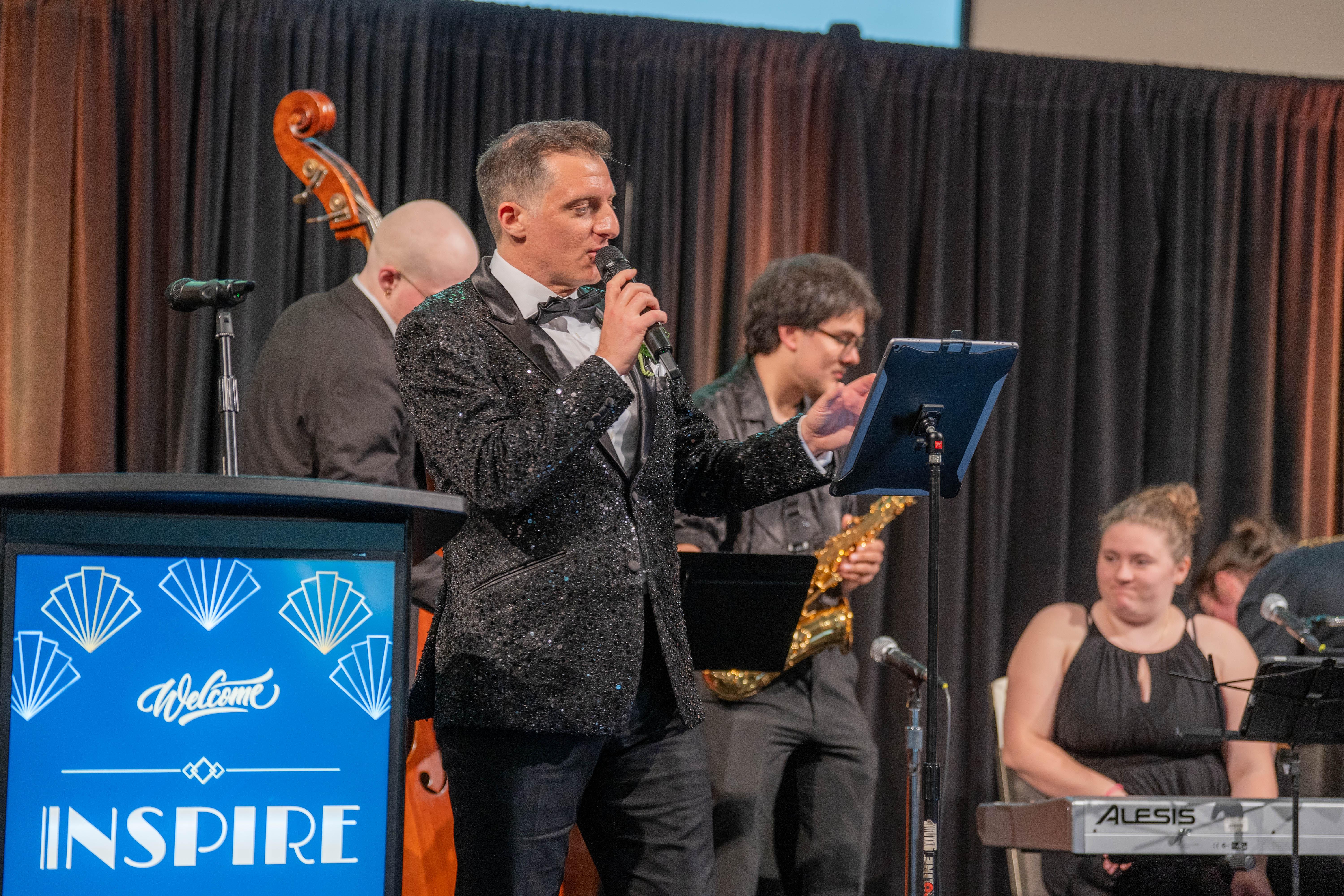 auctioneer with band auctioneer with band
