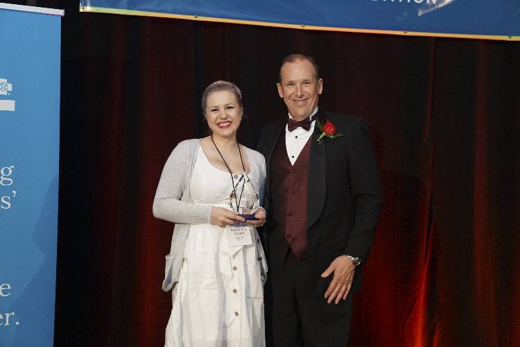 The 2019 Distinguished Alumni award was awarded to Kristina Ann Madden, a 2012 Edmonds CC graduate, and presented by Edmonds CC Foundation Executive Director Brad Thomas.