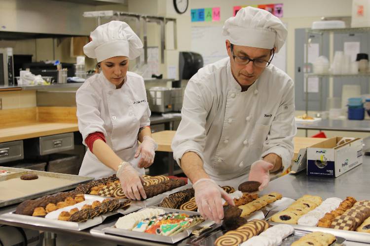 Baking students prepping cookies.