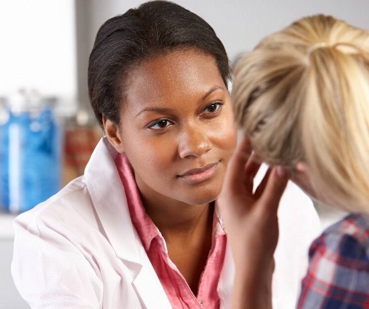 mental health technician talking with patient