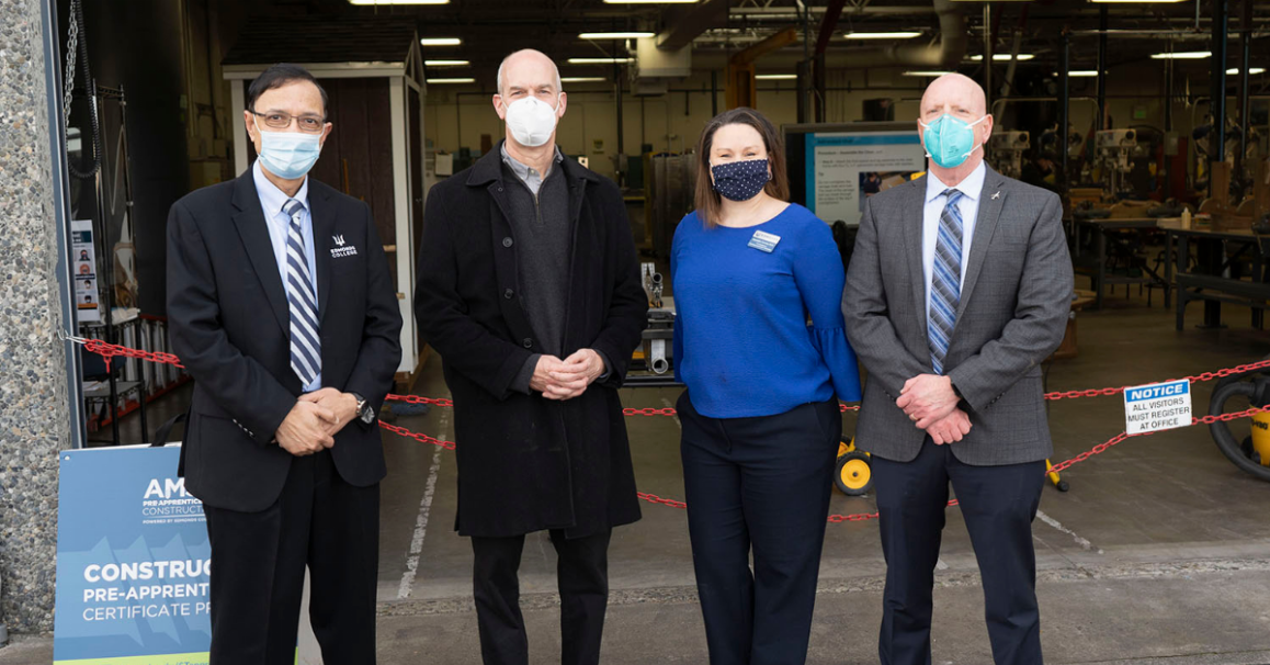 Edmonds College President Amit B. Singh, U.S. Rep. Rick Larsen, Edmonds College Vice President of Innovation & Strategic Partnership Danielle Carnes, Executive Director of BTC/WATR Center Larry Cluphf outside the Edmonds College Advanced Manufacturing Skills Center.