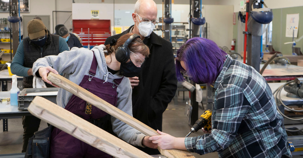 U.S. Rep. Rick Larsen watches Construction pre-Apprenticeship Program students