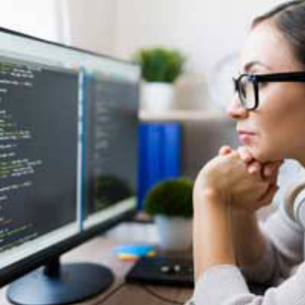 woman looking at a computer screen