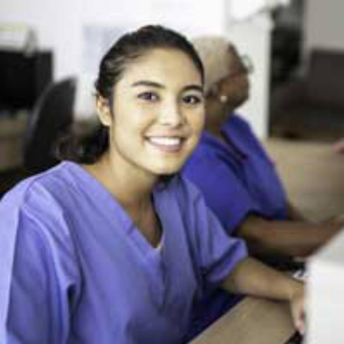 medical professional in using a computer