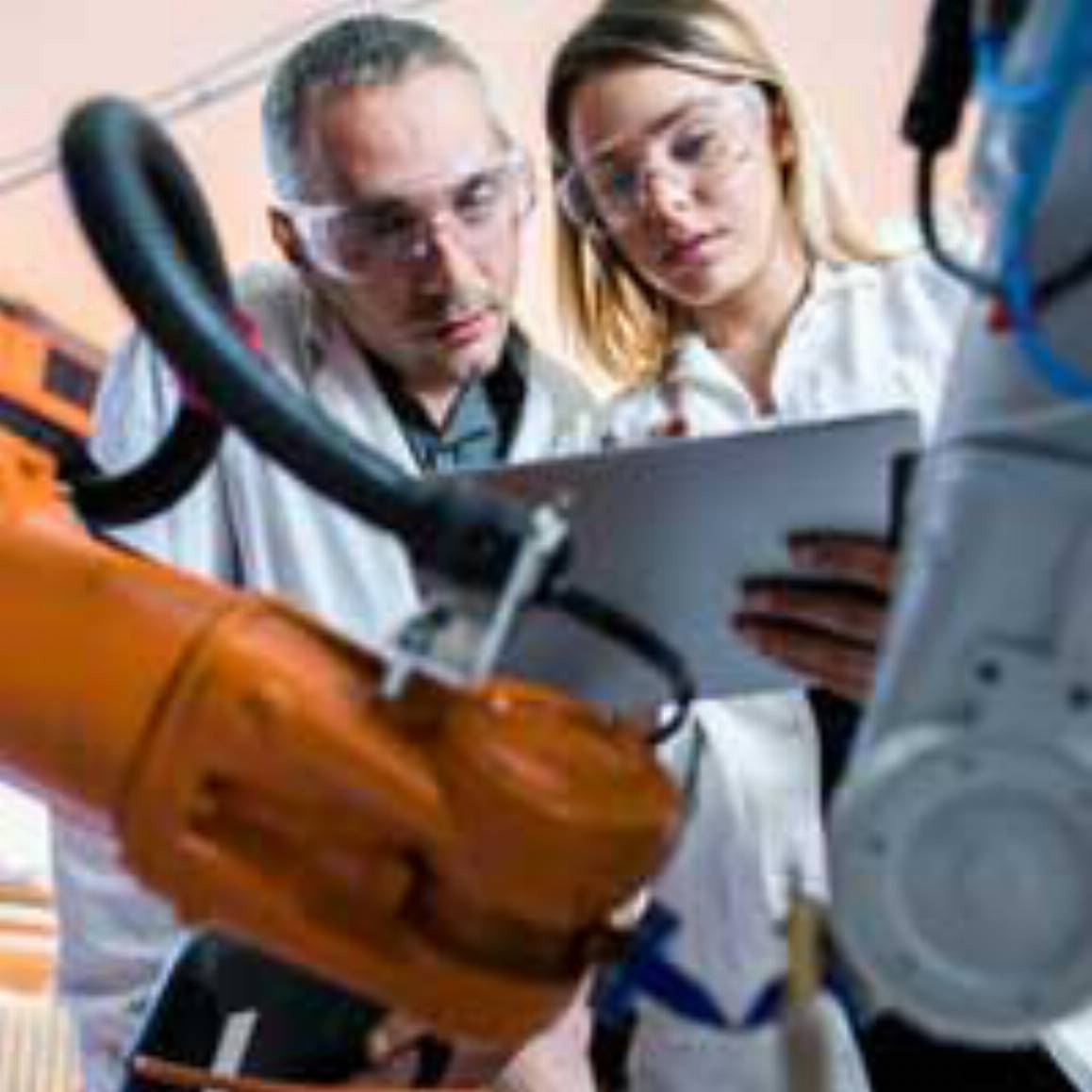 Man and woman on a production line