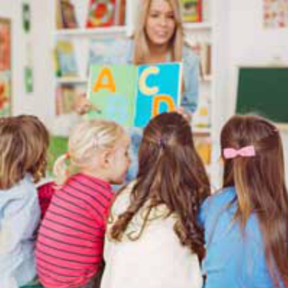 children listening to a teacher