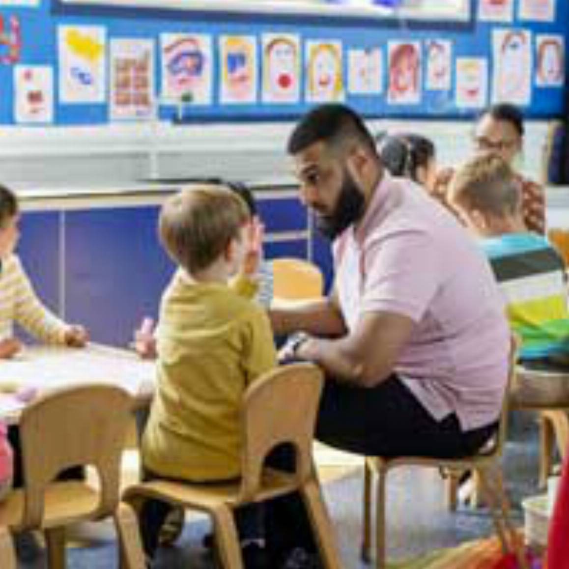 teacher talking to a child