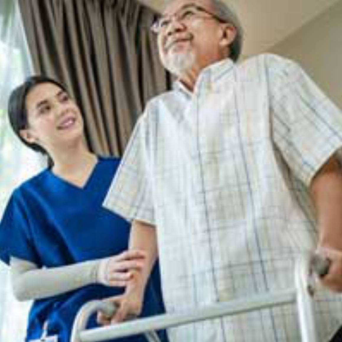 Home Health Aide helping patient