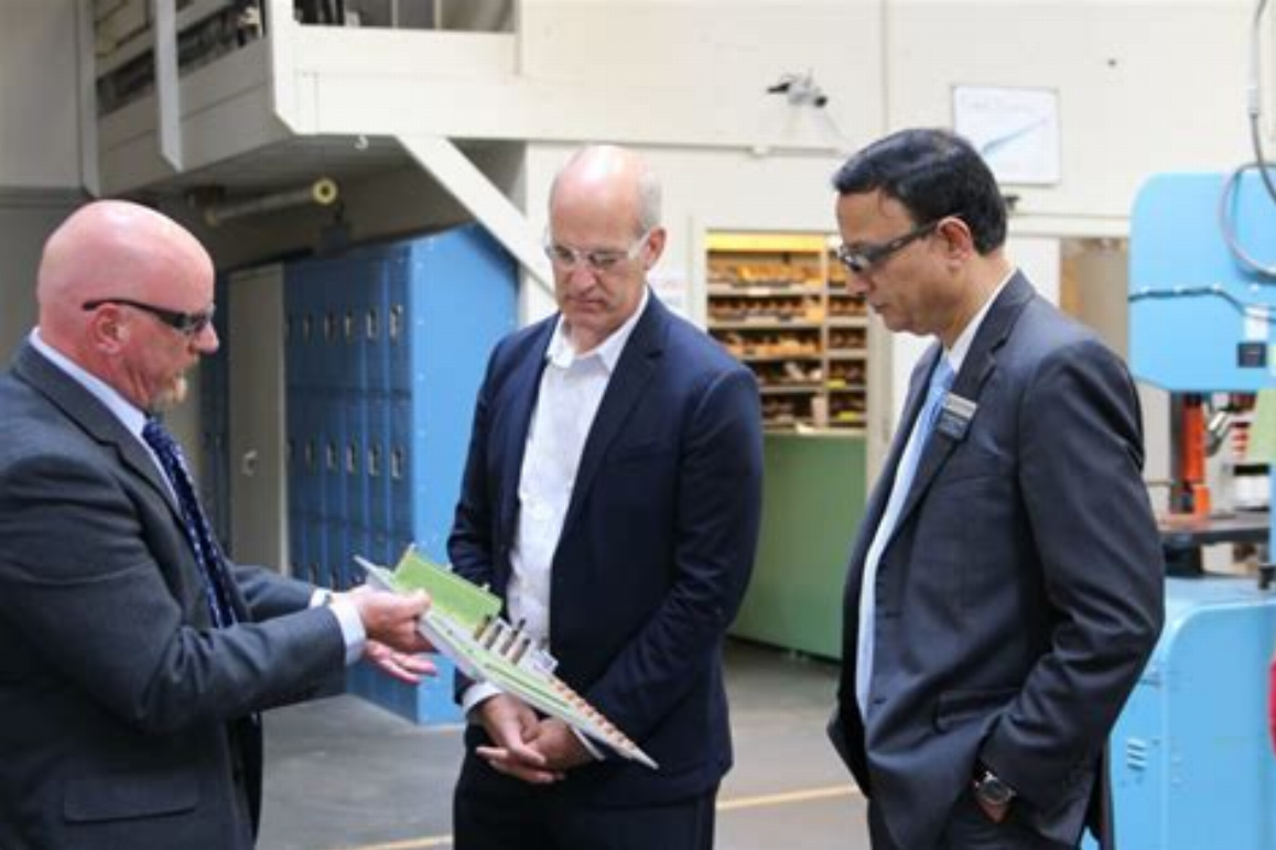 Edmonds College President Dr. Amit B. Singh and U.S. Rep. Rick Larsen during a visit to the Advanced Manufacturing Skills Center (AMSC)