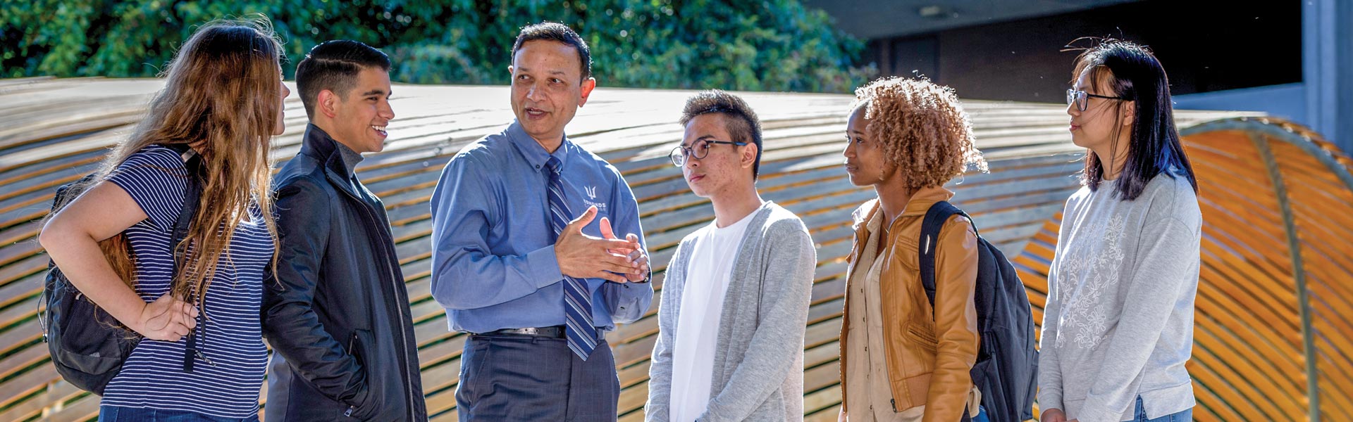 Dr. Amit B. Singh talking with students