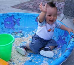 Child playing in the pool