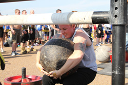 Kristyn Whisman, Dean of Corrections, winning the title of America's Strongest Woman. Photo: Ray Novak