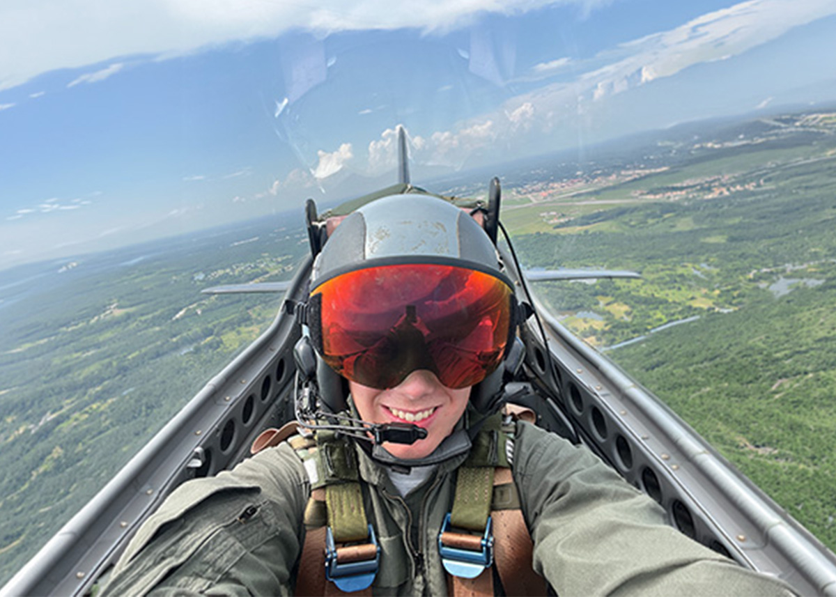 Tyler Ekse flying in a cockpit