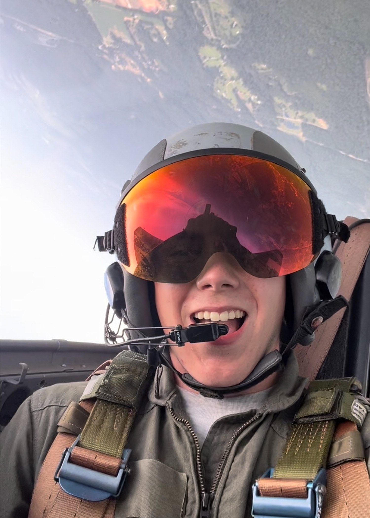 Tyler Ekse upside-down in the cockpit