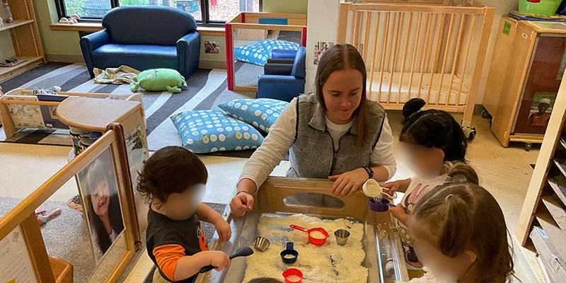 Teacher Annabelle Jaeger with pre-school students at the Edmonds College Center for Families.