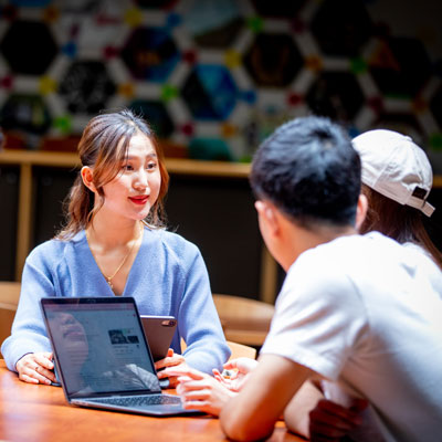 Students sitting and talking in Brier Hall