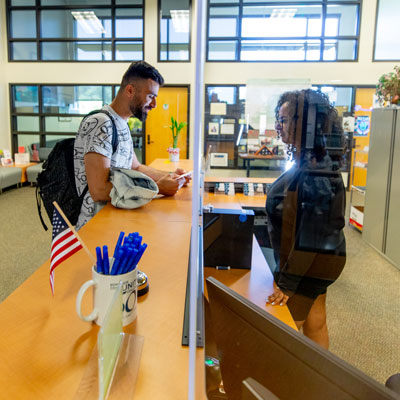 Students talking in the reception area of the Center for Student Engagement and Leadership