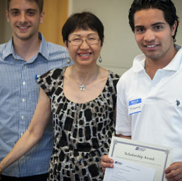 Scholarship recipient receiving an award