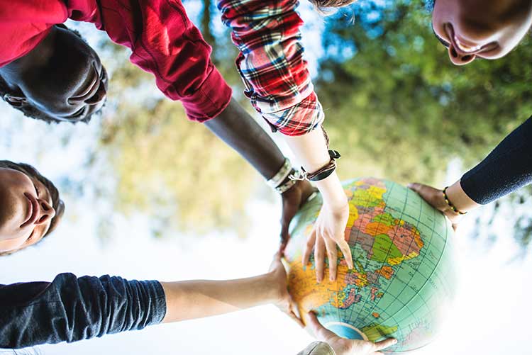 teenagers college student smiling with globe