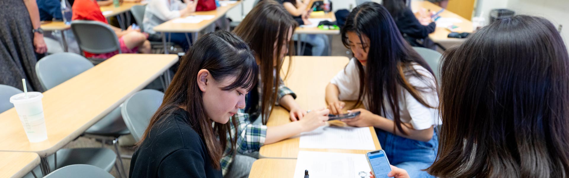 Students learning English in class