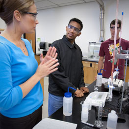 Students with instructor in a chemistry lab