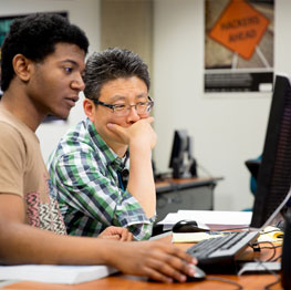 Students operating a computer