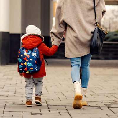 mother walking with a child
