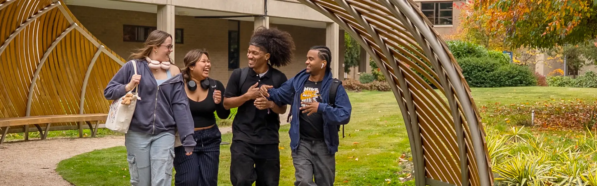 Group of students walking near Alderwood Hall
